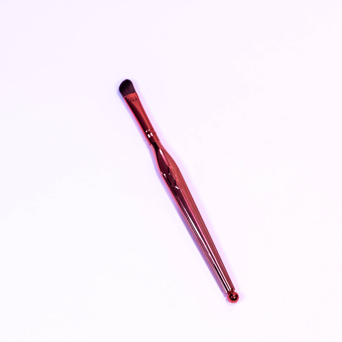 Zoni Stores Voce Angled Smoker Makeup Brush for smoky eye makeup, with angled bristles for precise eyeshadow blending.