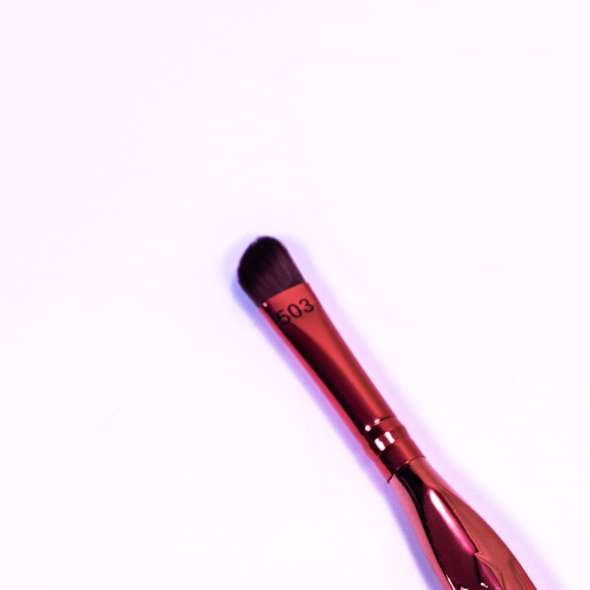 Zoni Stores Voce Angled Smoker Makeup Brush for smoky eye makeup, showing the angled brush with soft bristles on a white background.