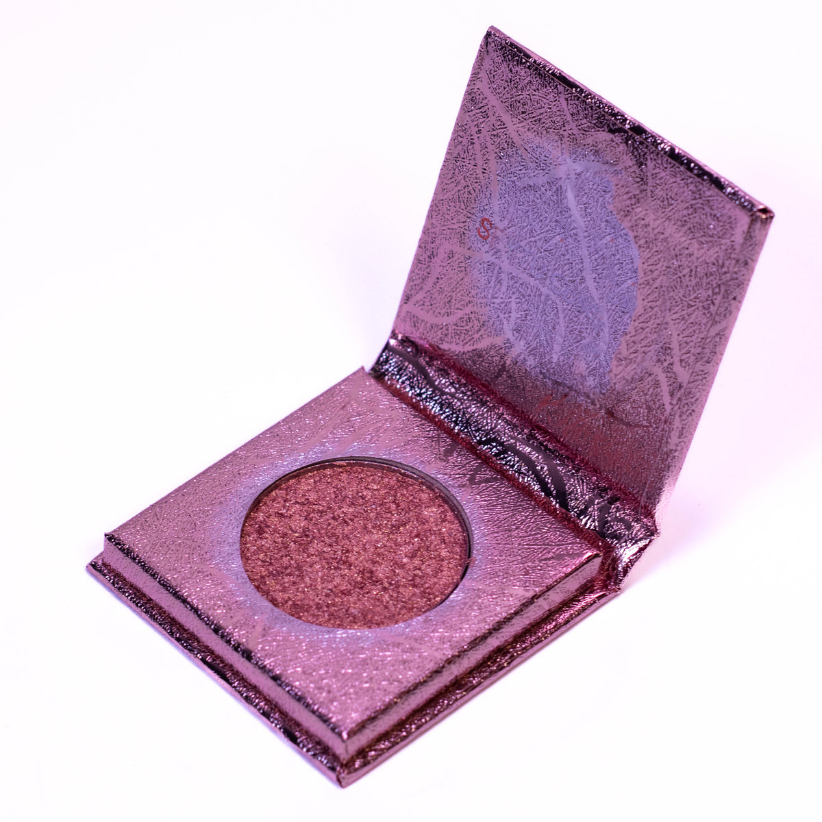 Zoni Stores SEYTU Cosmetica Eye Shadow palette with multiple colorful shades and textured finish, displayed open.