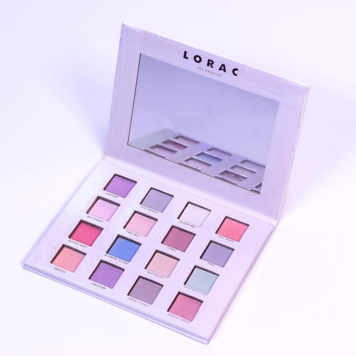 Lorac I Love Brunch pastel eyeshadow palette with soft pink, lavender, and neutral shades for dreamy eye makeup looks