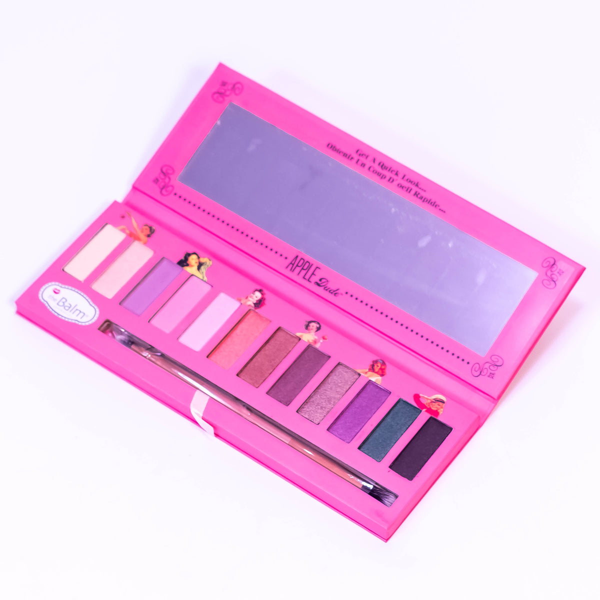 Zoni Stores The Balm Apple 7 Eye Shadow Palette with 12 colorful shades arranged in a sleek compact.
