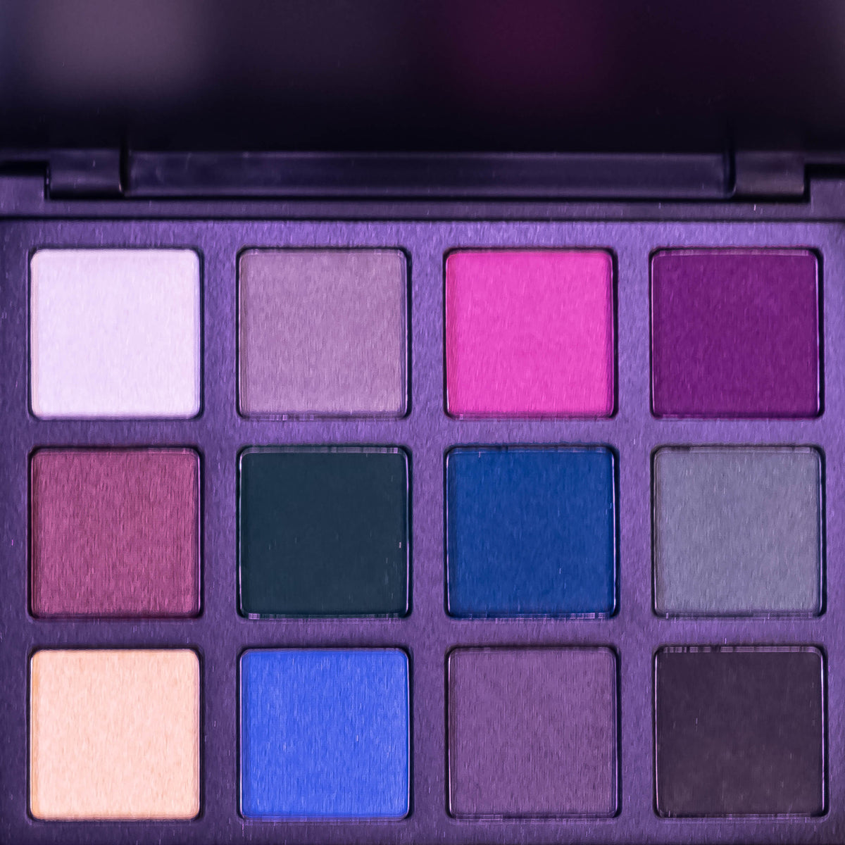 Zoni Stores Morphe Radiant Reflections eyeshadow palette with 12 shimmering natural shades, open to show the colorful pans.