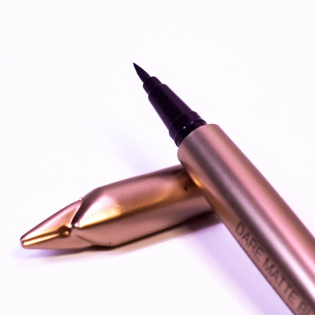Zoni Stores Midnight Intensity Dare Matte Black 24HR Waterproof Eyeliner pencil with sharpened tip on a white background