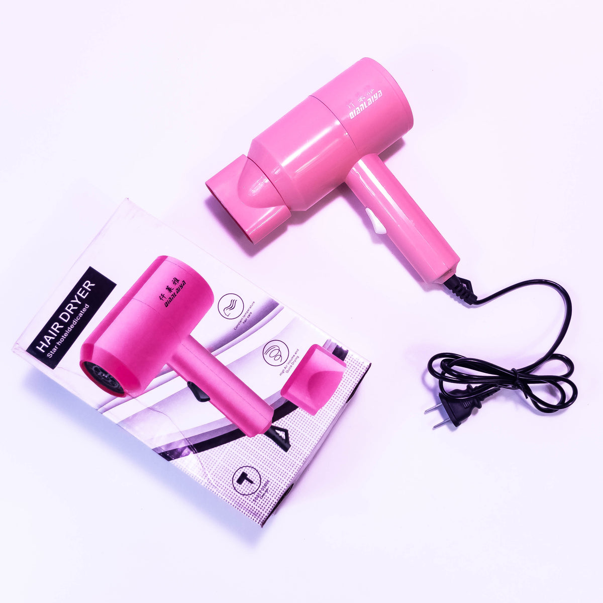 Mini Star Hair Dryer by Zoni Stores, compact handheld hair dryer with a sleek design and ergonomic handle.