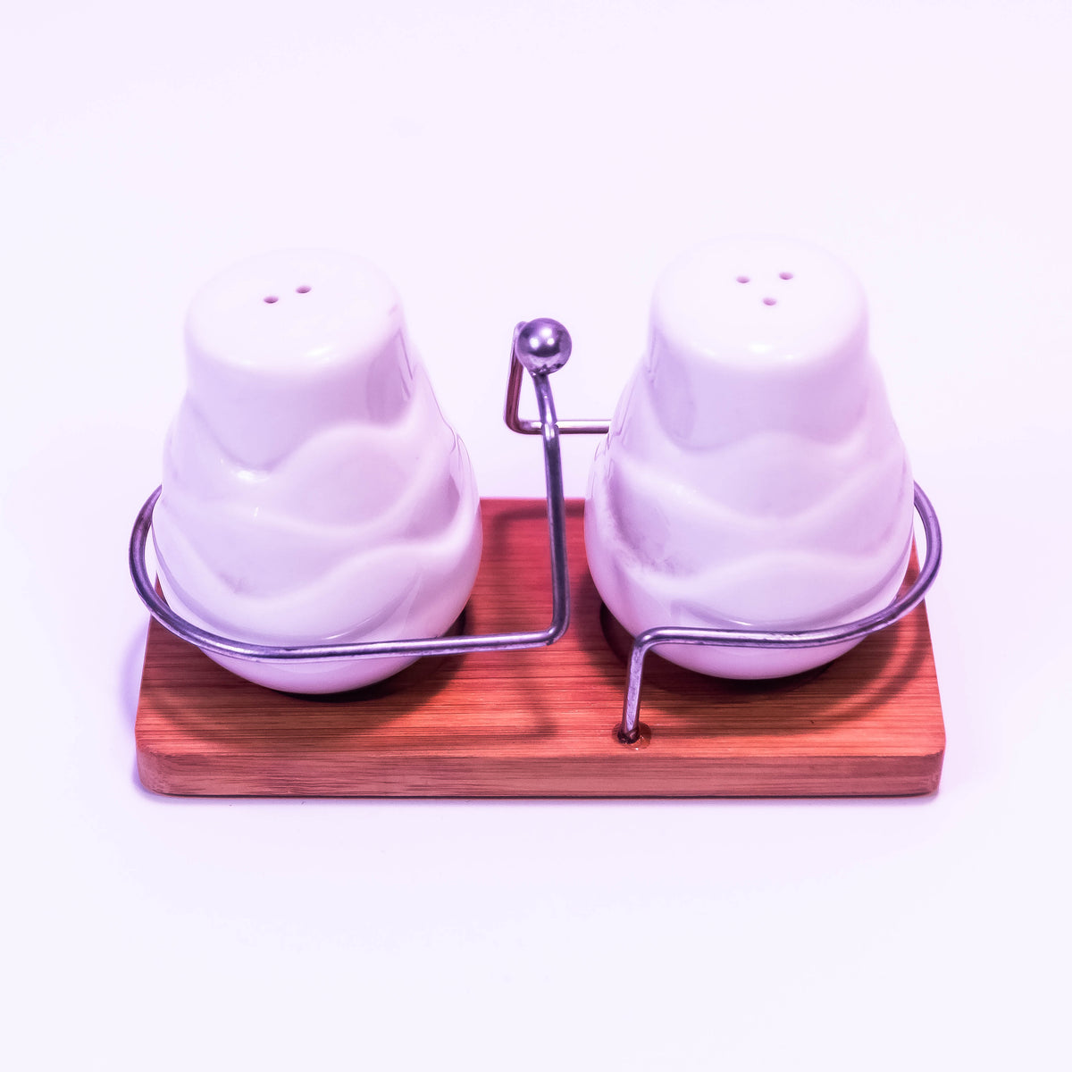 White oval shape salt box by ZoniStores with a lid, designed for storing salt in a stylish, compact kitchen accessory.