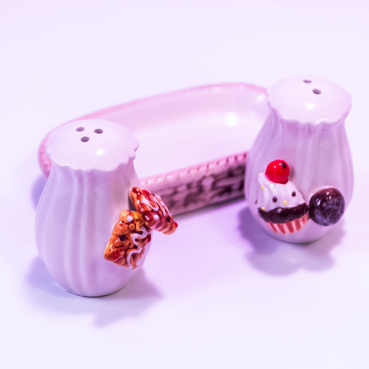 ZoniStores cookie and cupcake-shaped salt box with decorative design and lid, ideal for kitchen storage and salt storage.