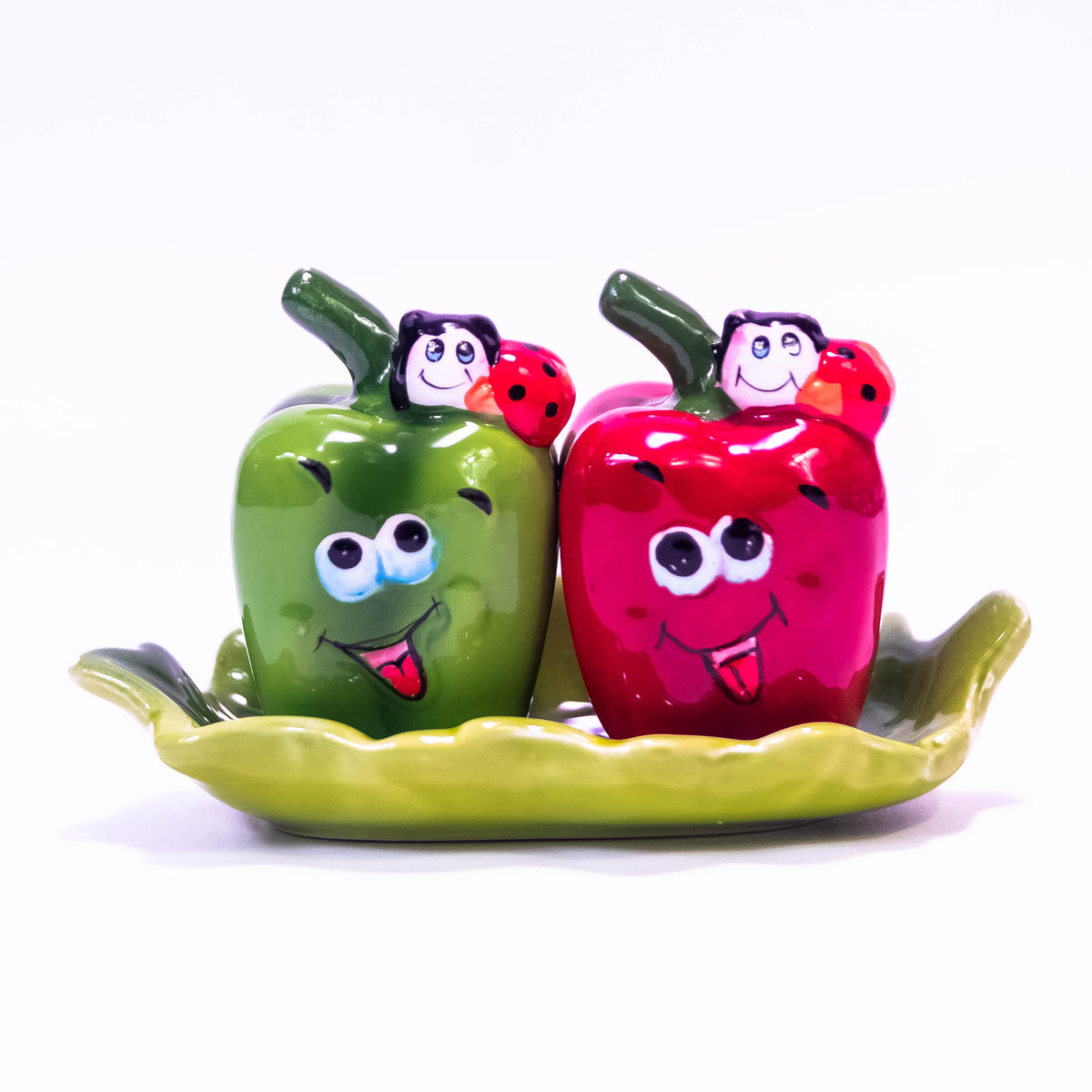 Green and red pepper-shaped salt box by ZoniStores, decorative ceramic container for storing salt or spices.