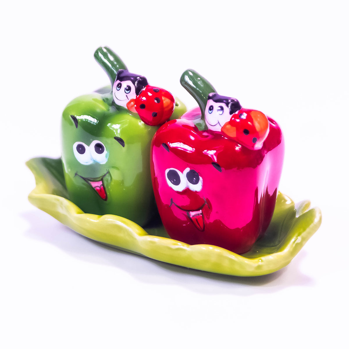 Green and red pepper-shaped salt box from ZoniStores, decorative kitchen storage for salt and spices.