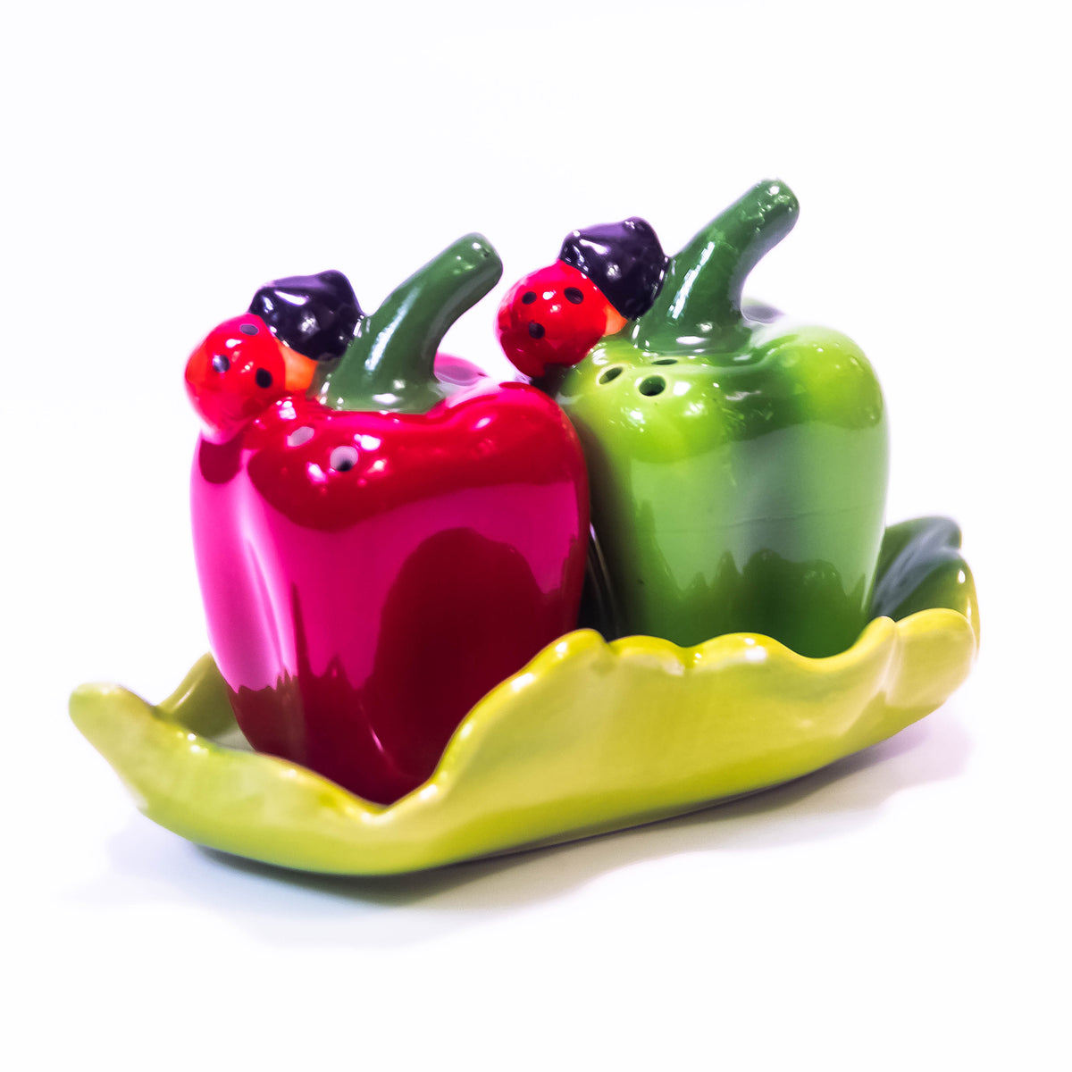 Green and red pepper-shaped salt box by ZoniStores, decorative ceramic container for storing salt.