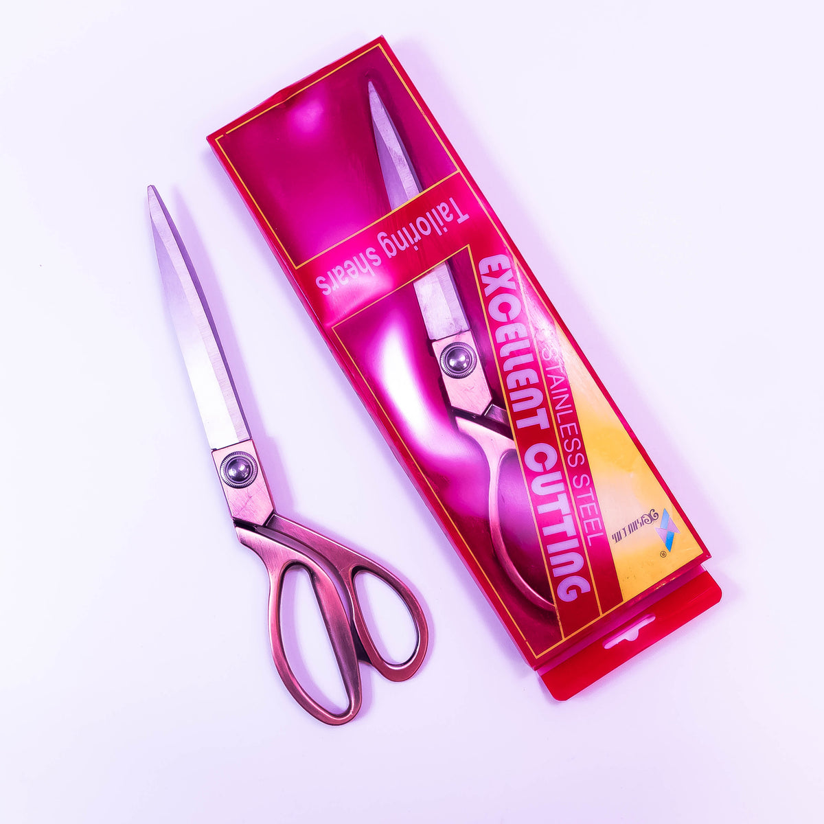Stainless steel tailoring sheers with brass handles, Zoni Stores scissor for fabric cutting and tailoring tasks.