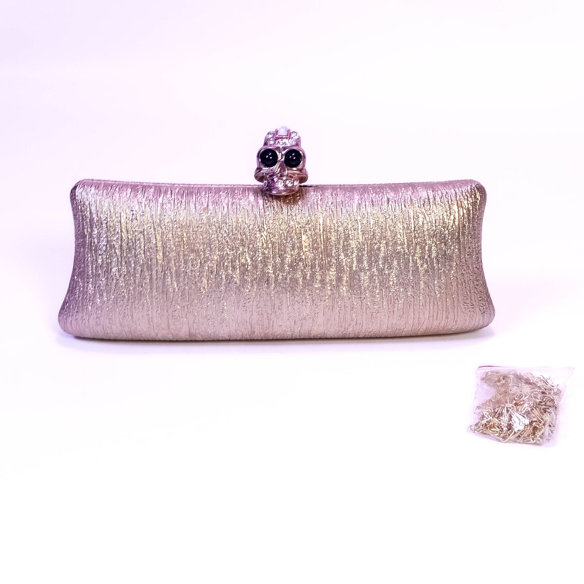 Gold metallic ladies clutch by ZoniStores featuring a sleek designer long design, perfect for elegant evening events.