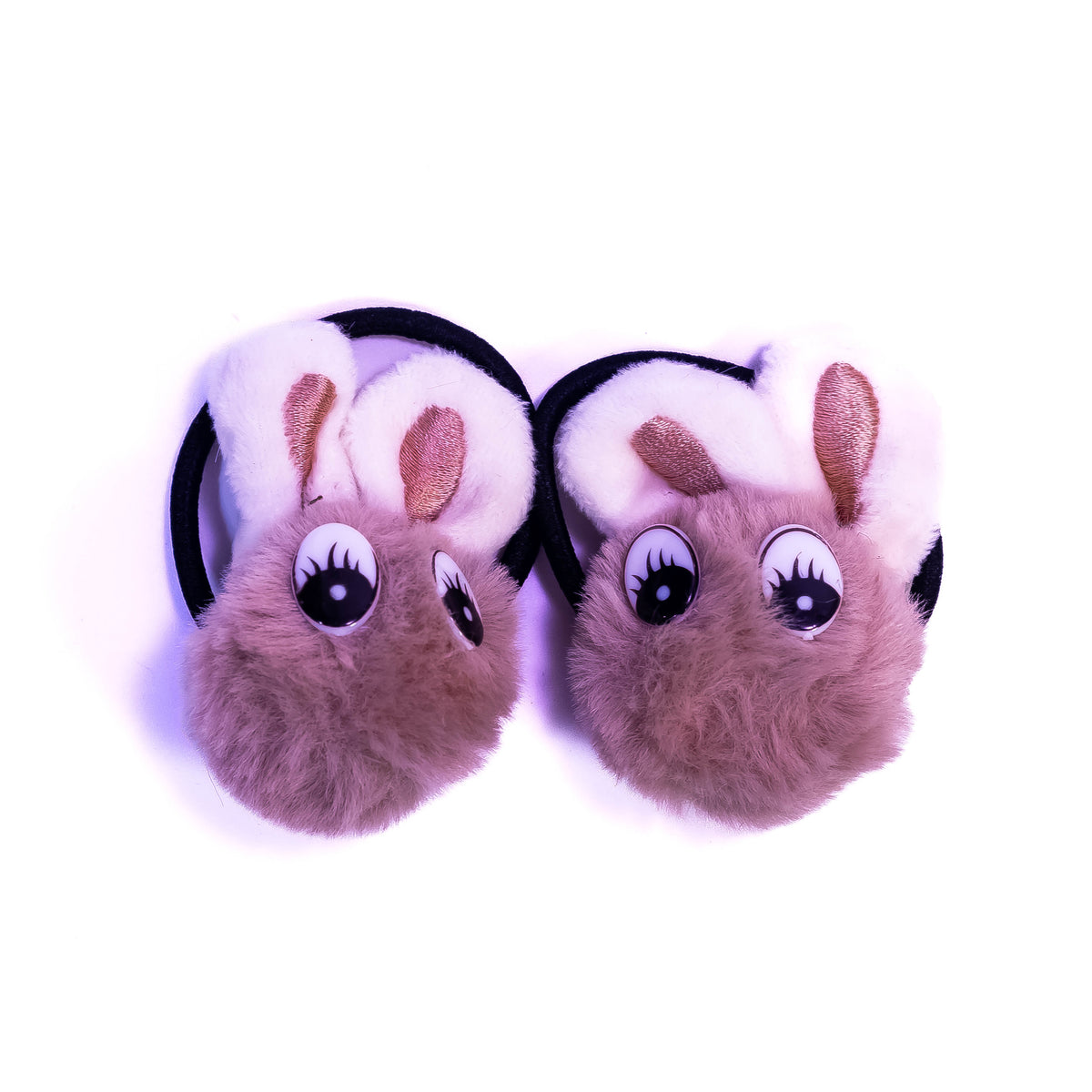 Pair of Bunny Bliss rabbit-themed hair bands from Zoni Stores, featuring cute bunny ears and playful design.