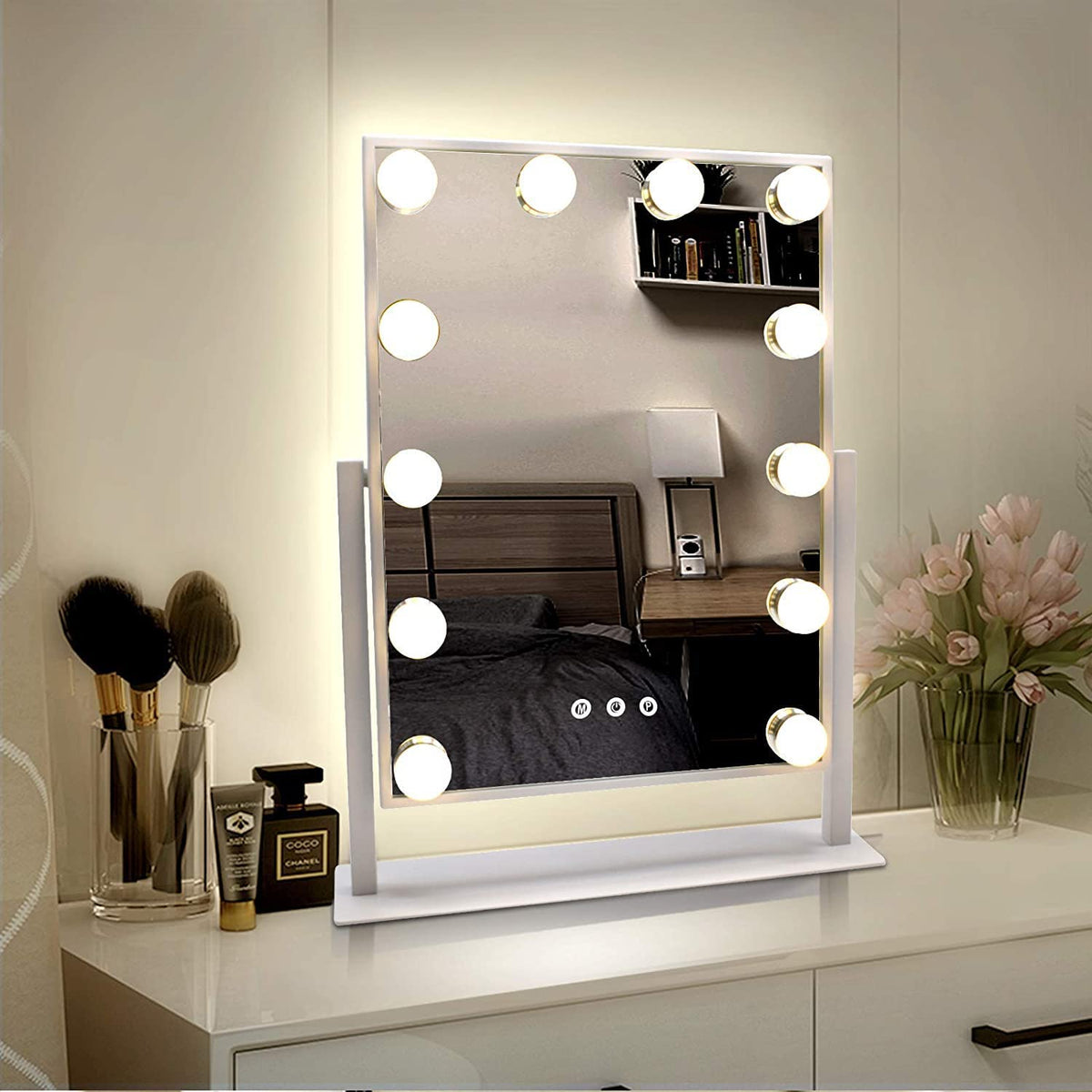 Modern Hollywood makeup mirror with a sturdy white base and surrounding LED lights for clear reflection from Zoni Stores