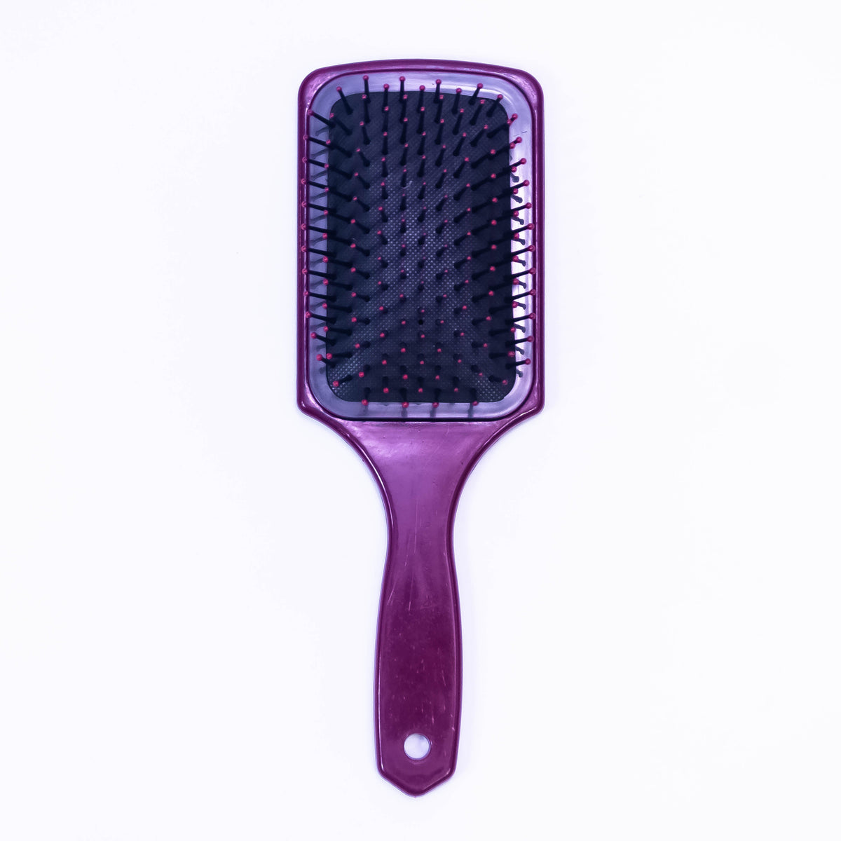 Printed Choco Color Hair Brush by Zoni Stores with ergonomic handle and bristles, designed for gentle hair detangling.