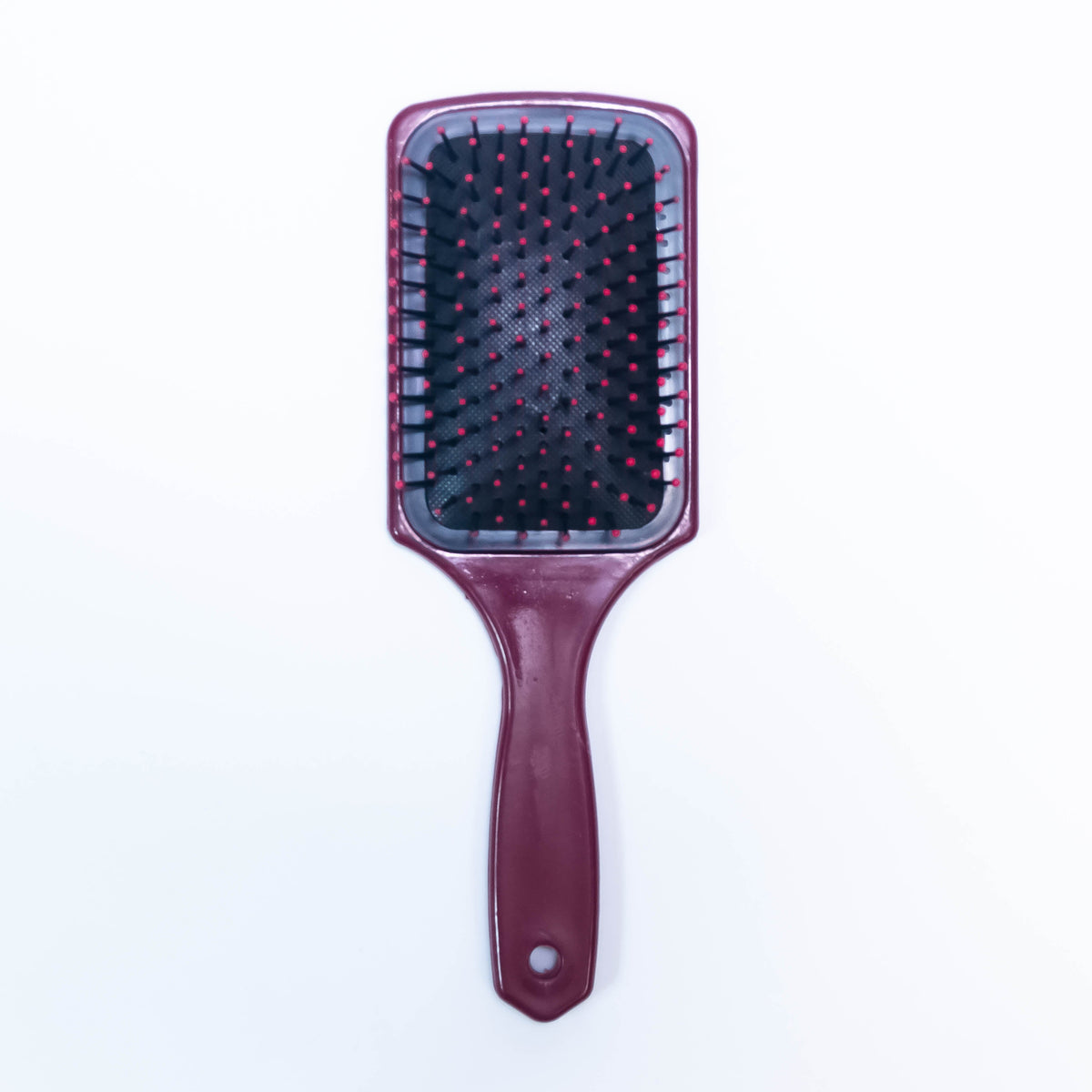 Printed Cordova Burgundy color hair brush by Zoni Stores with ergonomic handle and soft bristles for gentle hair care.