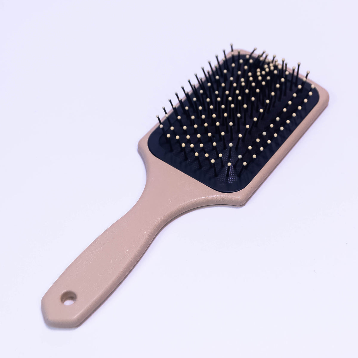 Printed Crimson Slate color hair brush by Zoni Stores with textured bristles for gentle styling and detangling.