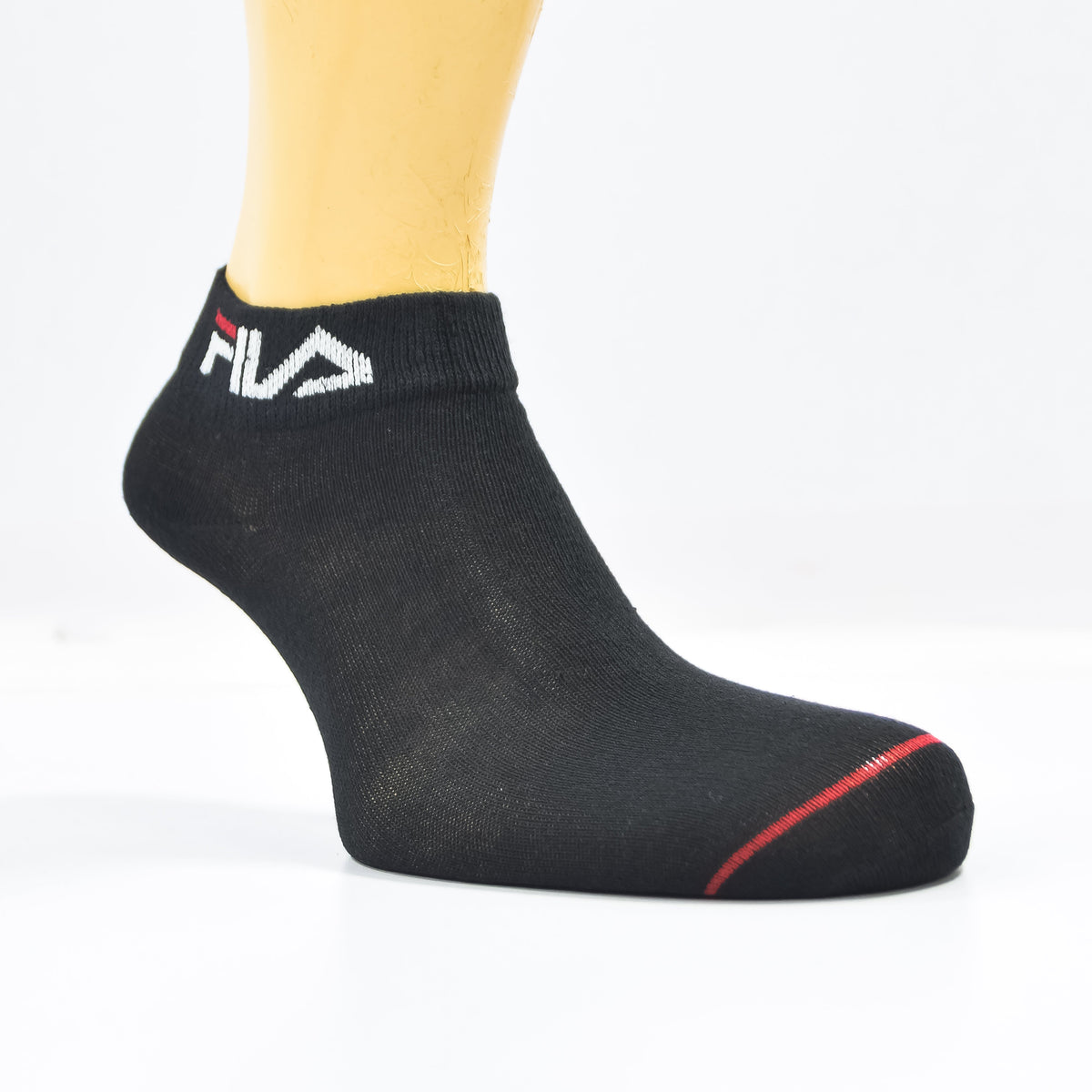 Set of three Zoni Stores branded F-i-l-a ankle socks in various colors, soft cotton material, close-up of sock textures and designs.
