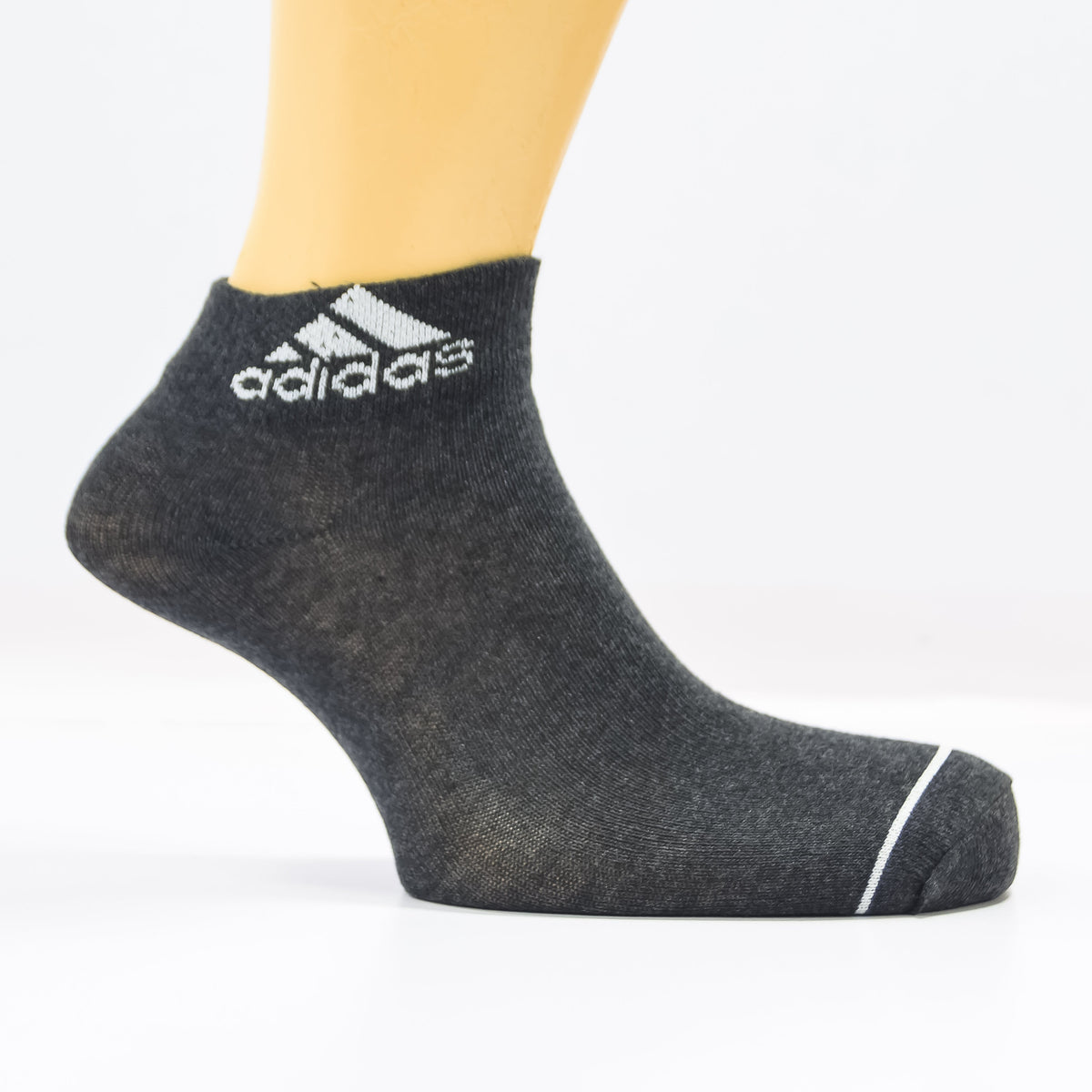 Set of three black Adidas ankle socks from Zoni Stores, featuring comfortable fit and classic design for everyday wear.