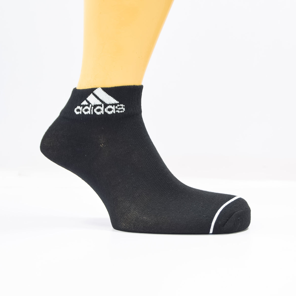 Pack of three Zoni Stores Adidas ankle socks shown in black, white, and gray, with ribbed cuffs and logo detail.