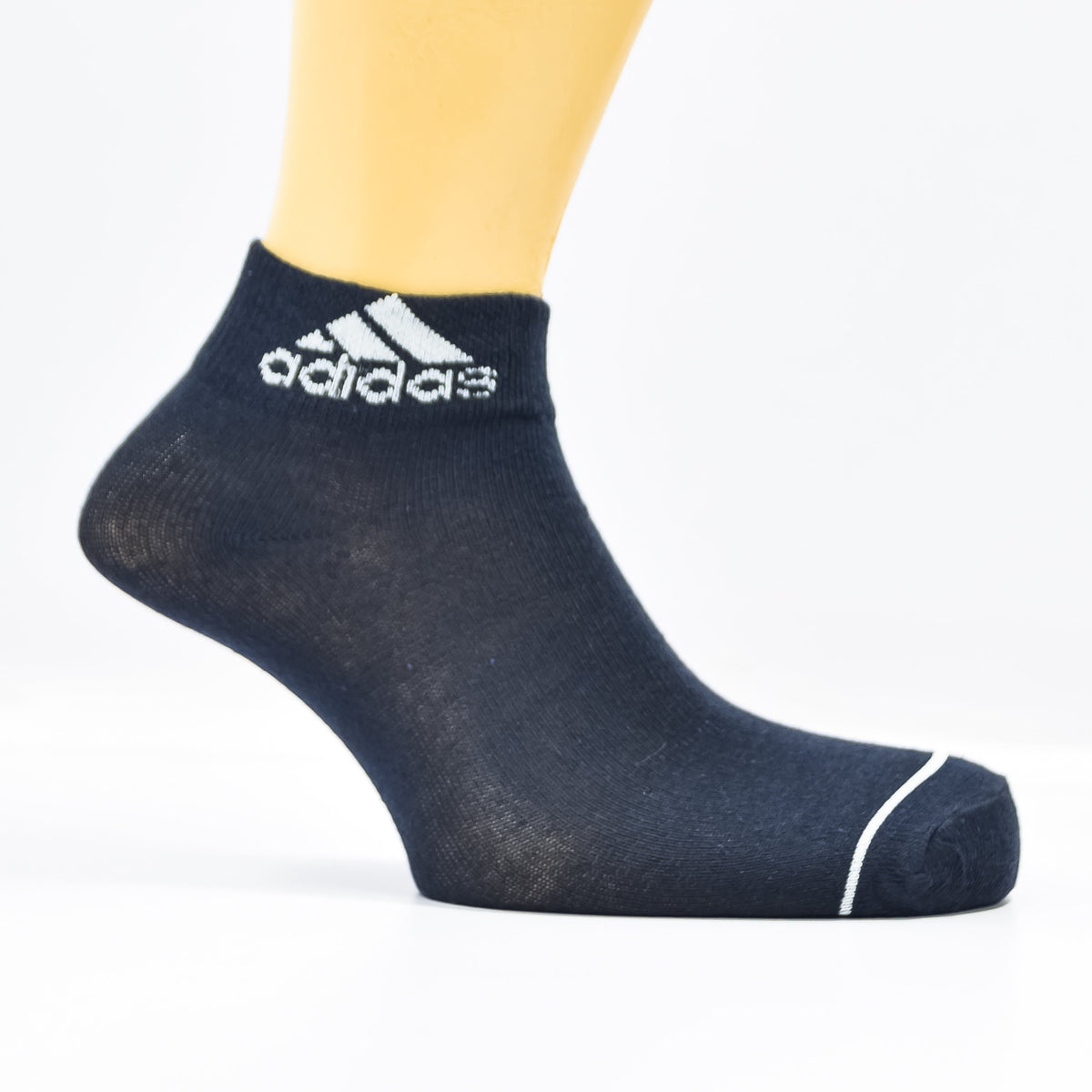 Set of three black Adidas ankle socks with white logo from Zoni Stores, casual athletic style for everyday wear.