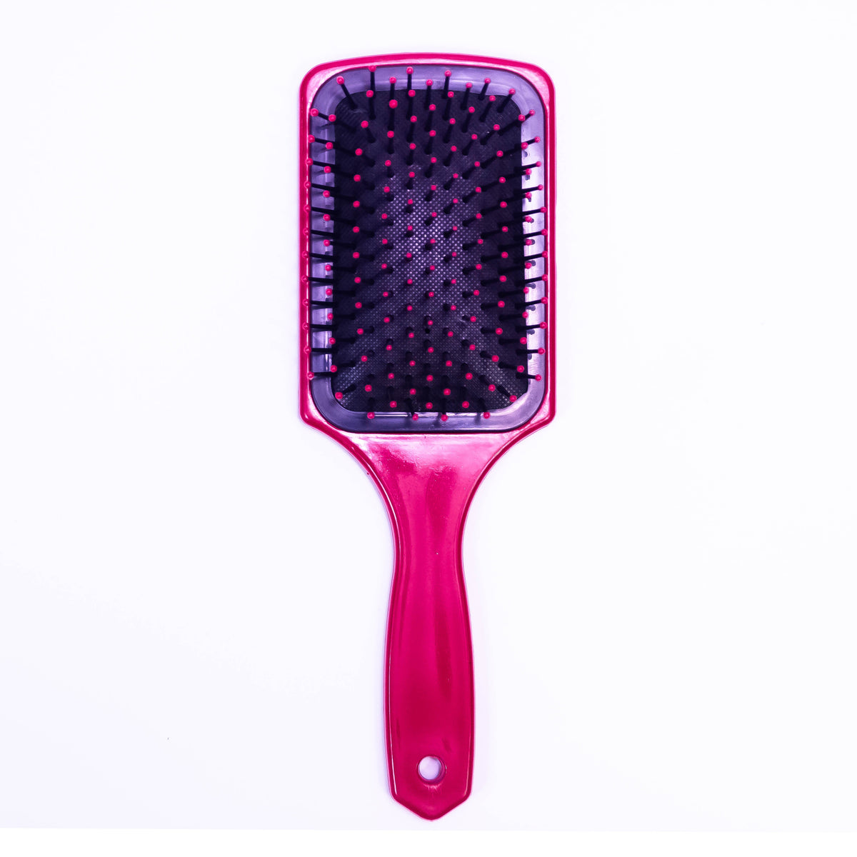 Printed Love Vessel color hair brush by Zoni Stores, showcasing a vibrant, textured design with bristles for styling hair.