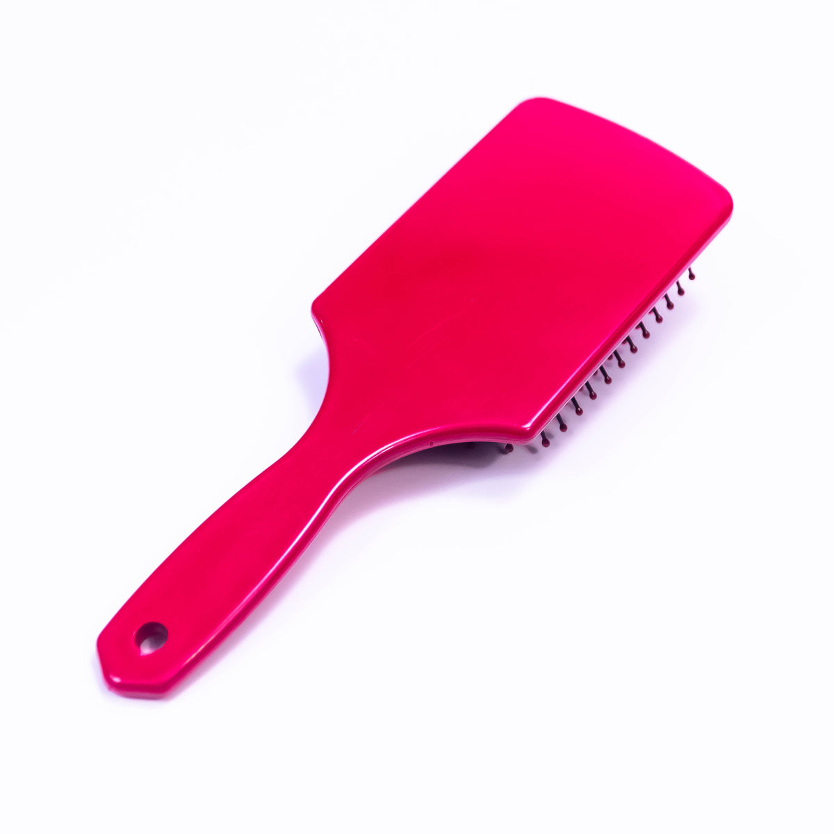 Printed Love Vessel color hair brush by Zoni Stores with colorful design and ergonomic handle, suitable for styling and detangling hair.