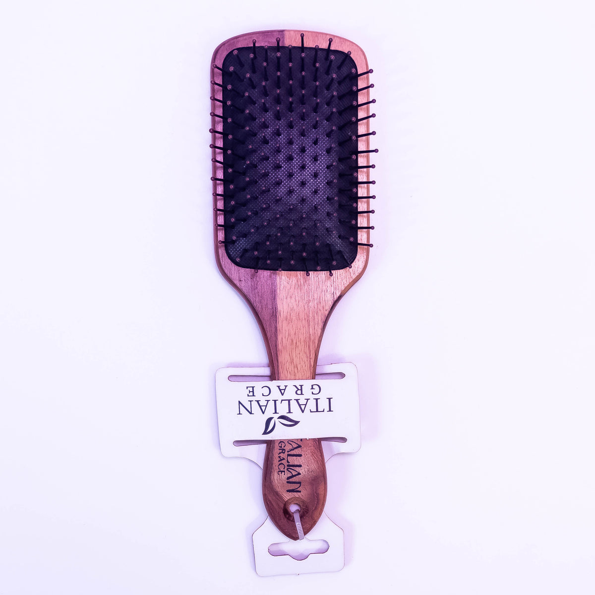 Wooden hair brush from Zoni Stores, showing natural wood finish and bristle side for gentle scalp massage and detangling.