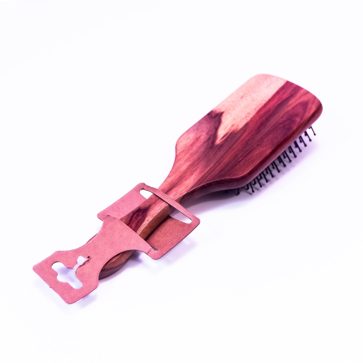 Wooden hair brush by Zoni Stores with natural wooden bristles and ergonomic handle for gentle styling and detangling.