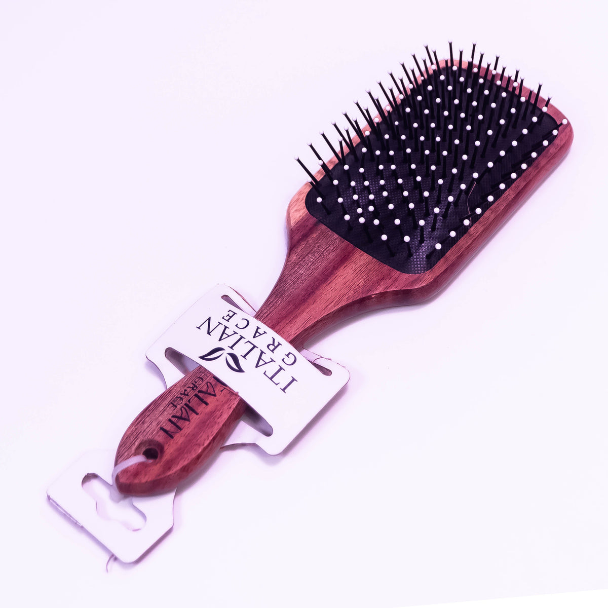 Wooden hair brush by Zoni Stores, showcasing natural wood bristles and ergonomic handle for gentle hair grooming.