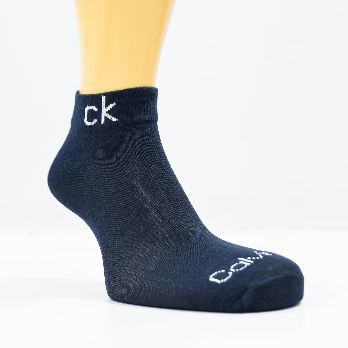 Pack of three Zoni Stores branded C-K ankle socks in black and white, featuring a comfortable fit and stylish design.