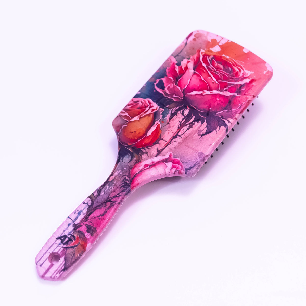 Wild Rose printed hair brush by Zoni Stores with floral design and ergonomic handle for smoothing and detangling hair.