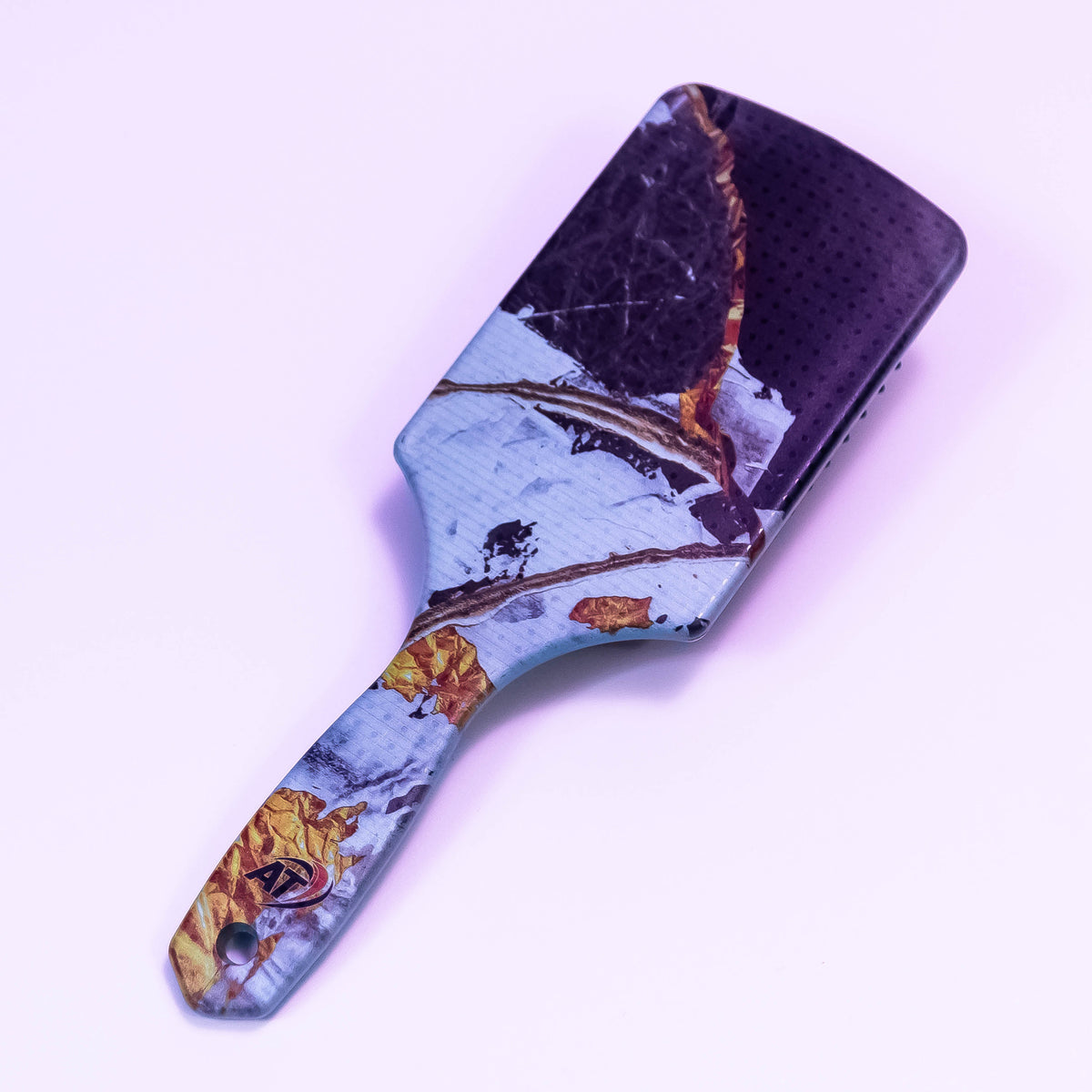 Night Sky printed hair brush by Zoni Stores featuring a celestial moon and star design on a sleek black hairbrush.