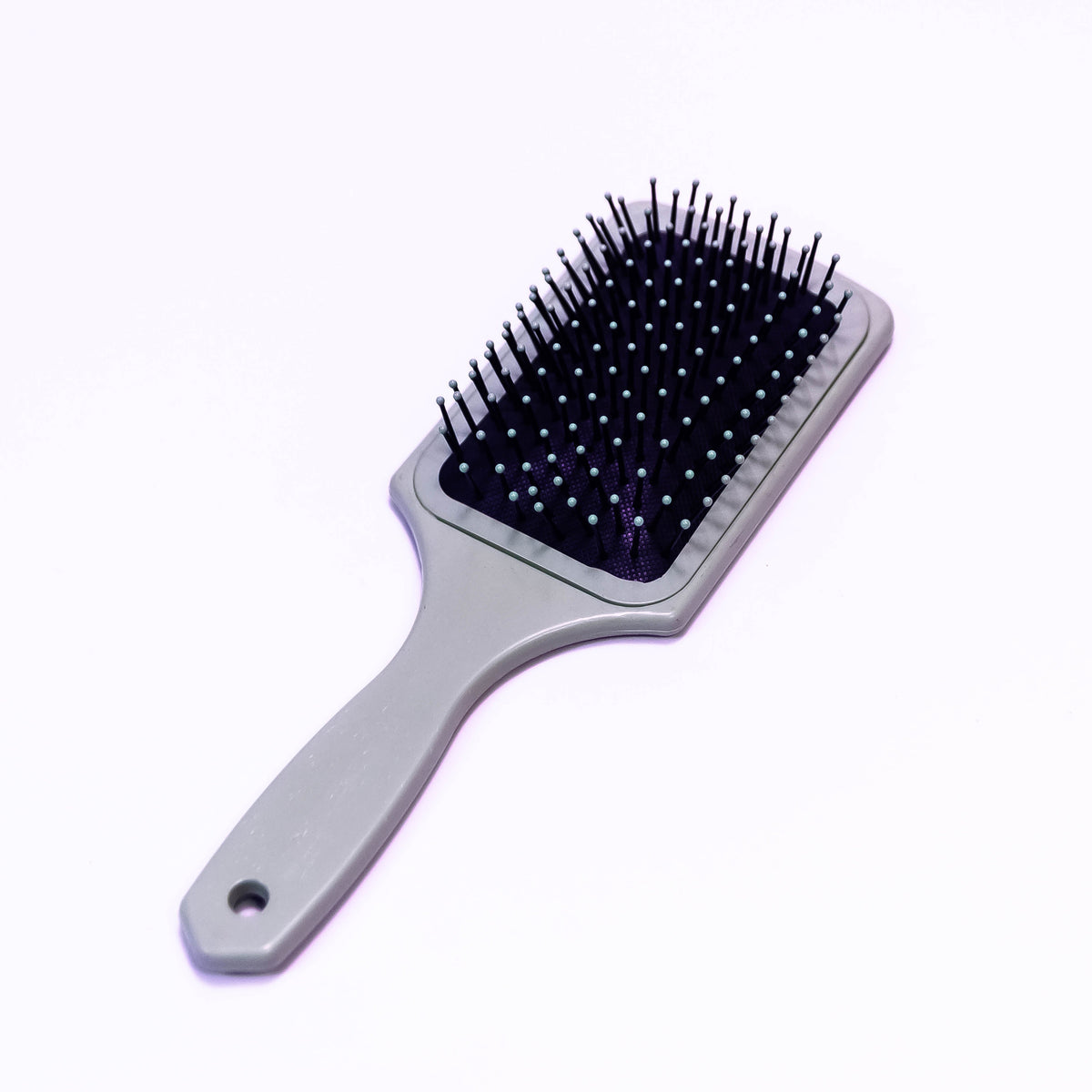 Printed Lady Hair Brush by Zoni Stores with decorative floral design, featuring smooth bristles for gentle hair detangling.