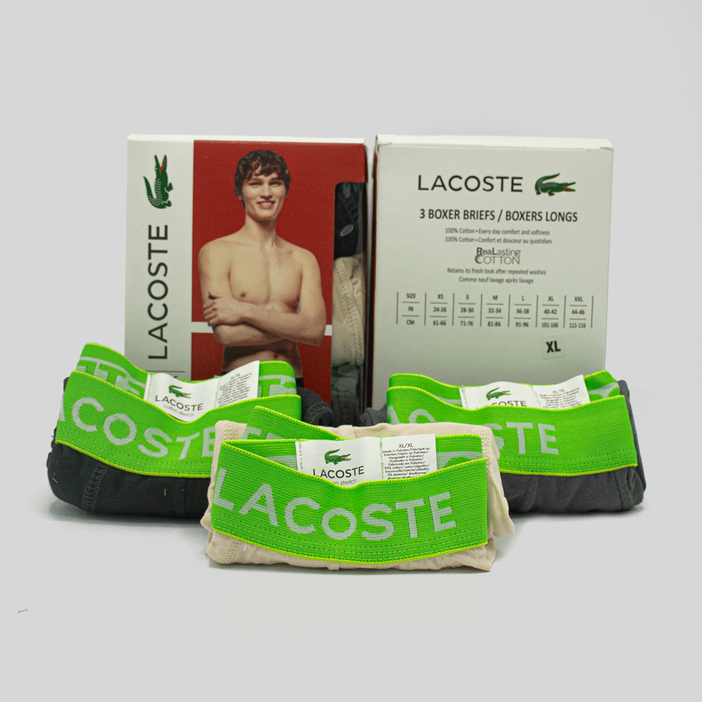 Pack of three Lacoste branded men's boxer briefs in various colors, featuring the Lacoste logo on the waistband.
