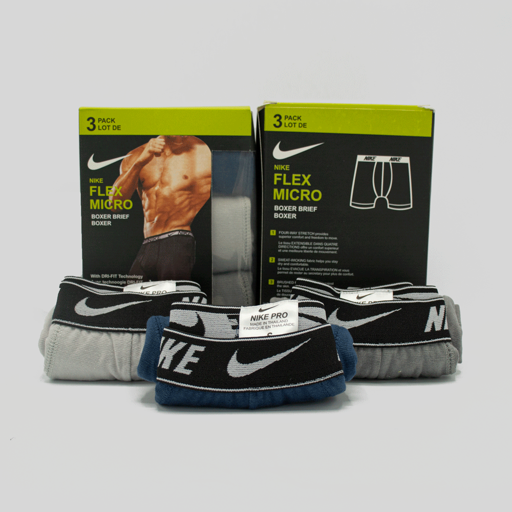 Set of three Nike branded men's boxer briefs featuring the Nike logo and comfortable fit, ideal for everyday wear.