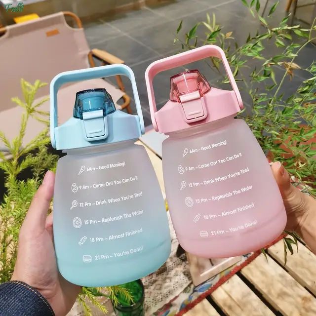 1300ML oval-shaped fitness water bottle with direct sip mouthpiece showcased on a kitchen shelf in Pakistan