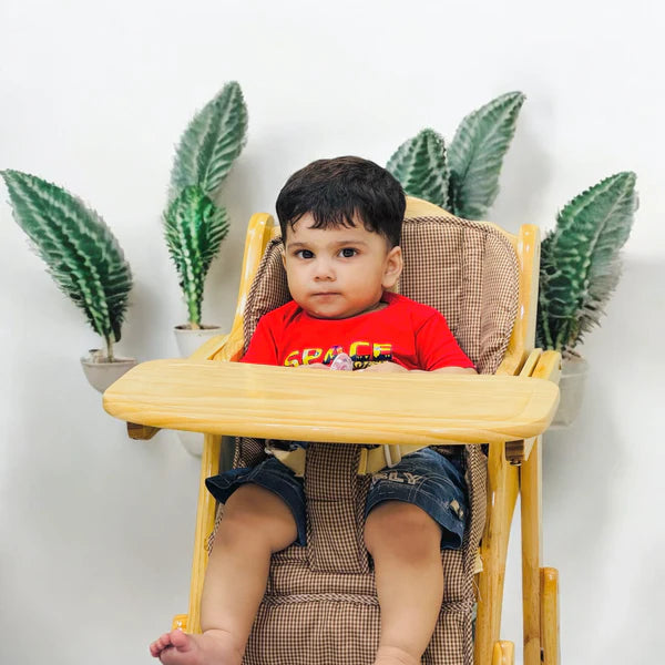 Adjustable wooden high chair for dining at Zoni Stores
