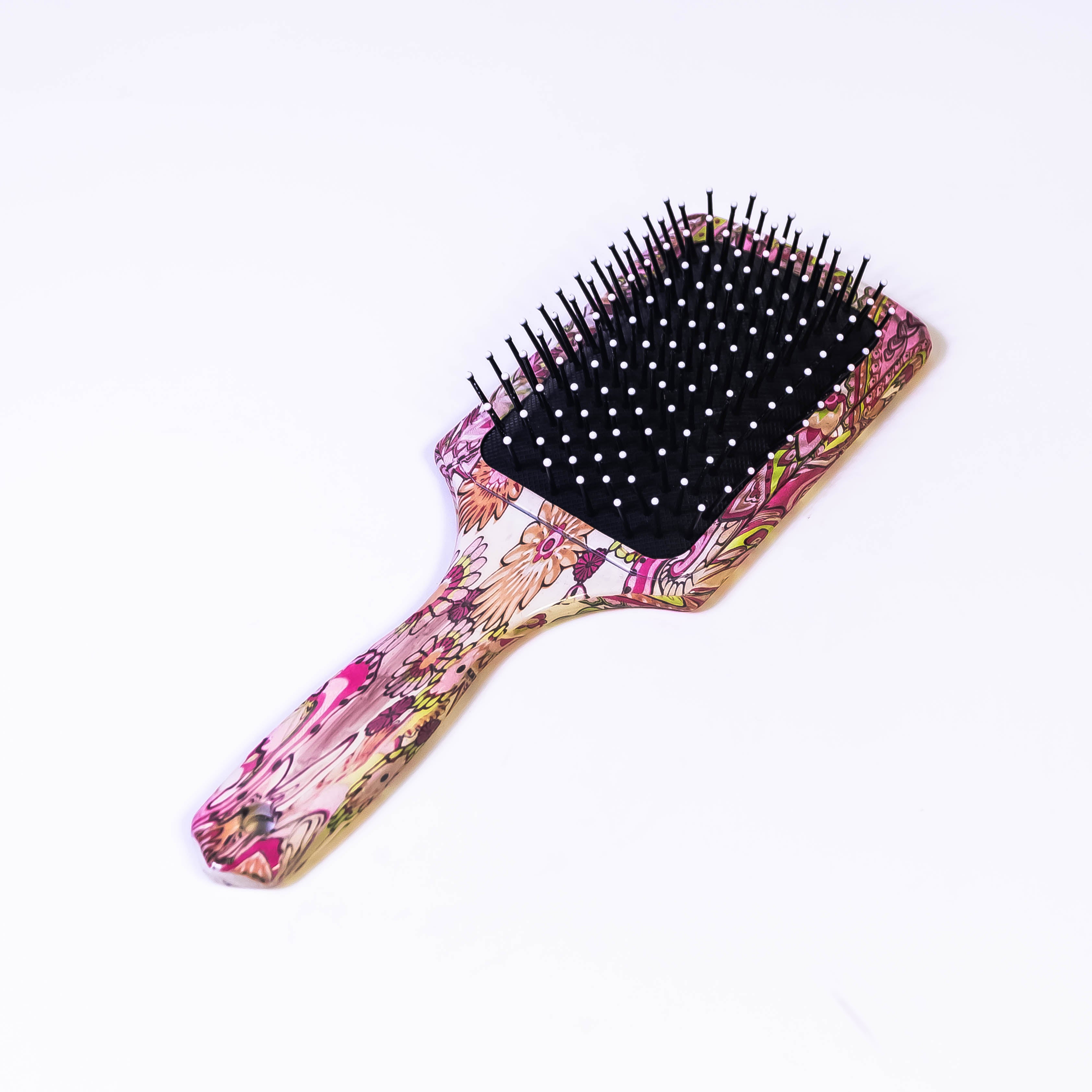 Hair Brush with Paisley Flower and Butterfly Design: A Stylish and Gentle Hair Care Companion