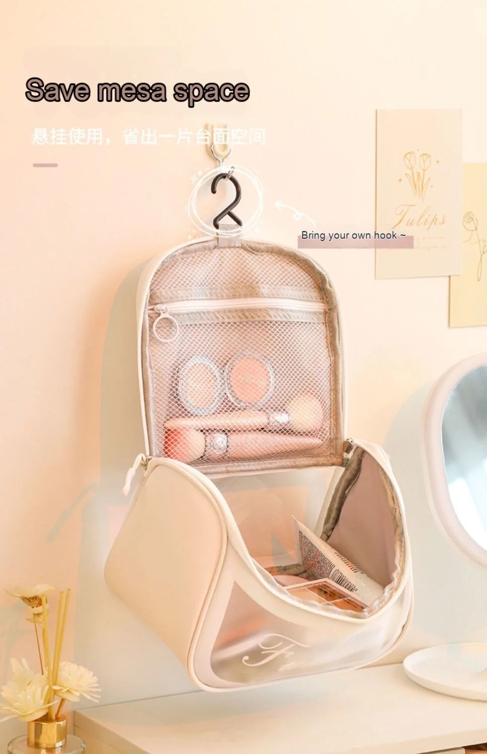 Beige hanging travel makeup bag with an integrated hook holding cosmetics and brushes on a wall.