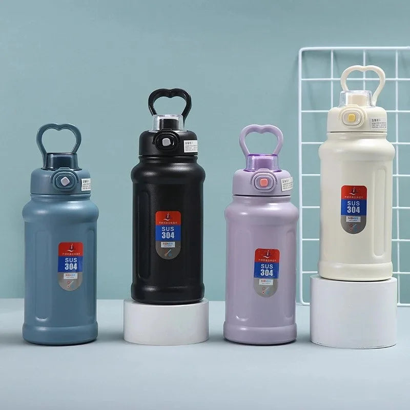 Vacuum insulated school water bottles for kids featuring a leakproof push-button lid design.