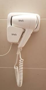 Quiet and durable wall hung hair dryer at Zoni Stores