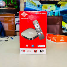 MagicPlay Android TV box with remote, featuring YouTube and Netflix support, available at Zoni Stores Pakistan.