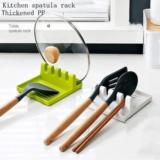 Multi-color silicone spoon rest pad on a wooden table in Pakistan by Zoni Stores