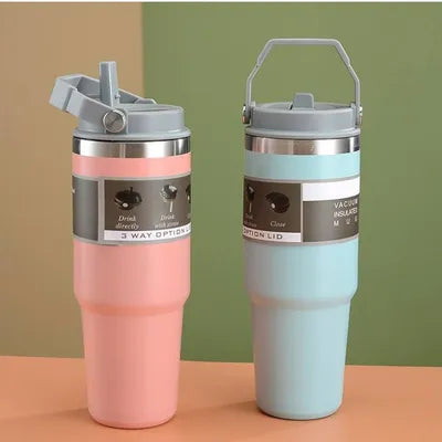Stainless steel insulated vacuum tumbler in pink and blue with 3 way lid by Zoni Stores