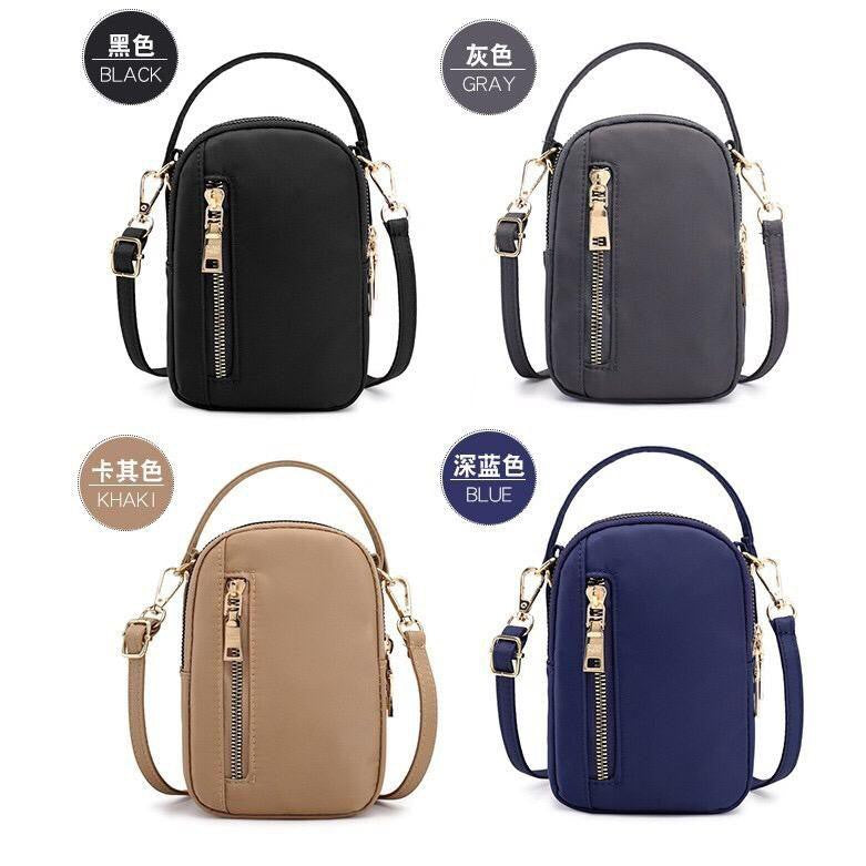 ZoniStores branded  mobile pouch with zipper detail and adjustable strap for women in Pakistan