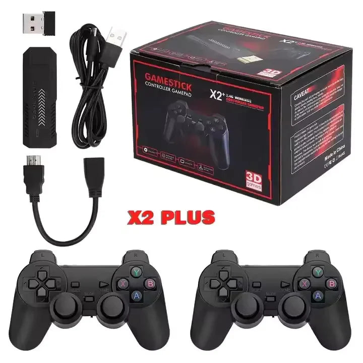 A complete set of the X2 Plus wireless game stick system, featuring the console, two black game controllers, a USB receiver, a power cable, and an HDMI extension cable, all arranged against a white background.