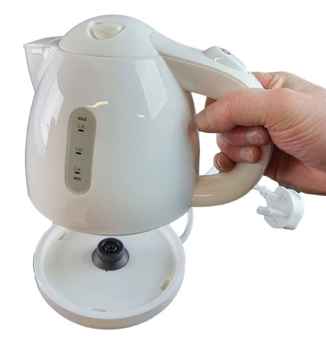 Cream colored electric kettle with water level indicator