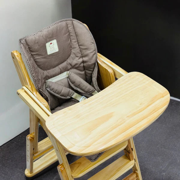 Wooden baby feeding chair with safety harness
