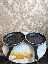 Durable non-stick kitchen frying pan available in multiple sizes