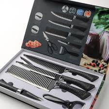 Durable and sharp kitchen knife set laid out neatly on a kitchen counter